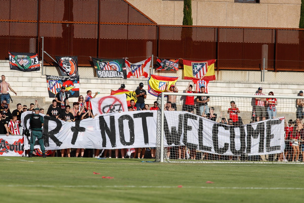 July 27, 2022, EL BURGO DE OSMA, SORIA, SPAIN: Fans of Atletico de Madrid with a banner against Cristiano Ronaldo during the spanish friendly, football match played between Numancia and Atletico de Ma ...