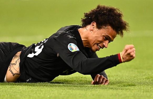 epa09297417 Leroy Sane of Germany reacts during the UEFA EURO 2020 group F preliminary round soccer match between Germany and Hungary in Munich, Germany, 23 June 2021. EPA/Lukas Barth-Tuttas / POOL (R ...