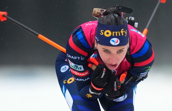 FILE - Julia Simon of France competes during the women&#039;s 10 km pursuit race at the Biathlon World Championship in Nove Mesto na Morave, Czech Republic, Sunday, Feb. 11, 2024. (AP Photo/Petr David ...