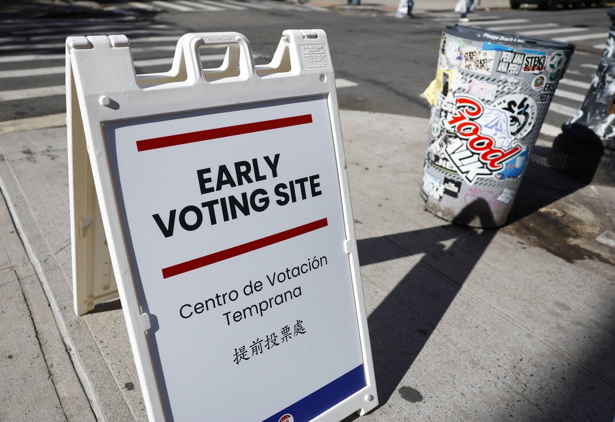 Signs directing voters to a nearby polling station are set up outside as voters cast their ballots on the weekend before the November 3rd election on Saturday, October 24, 2026 in New York City. Early ...