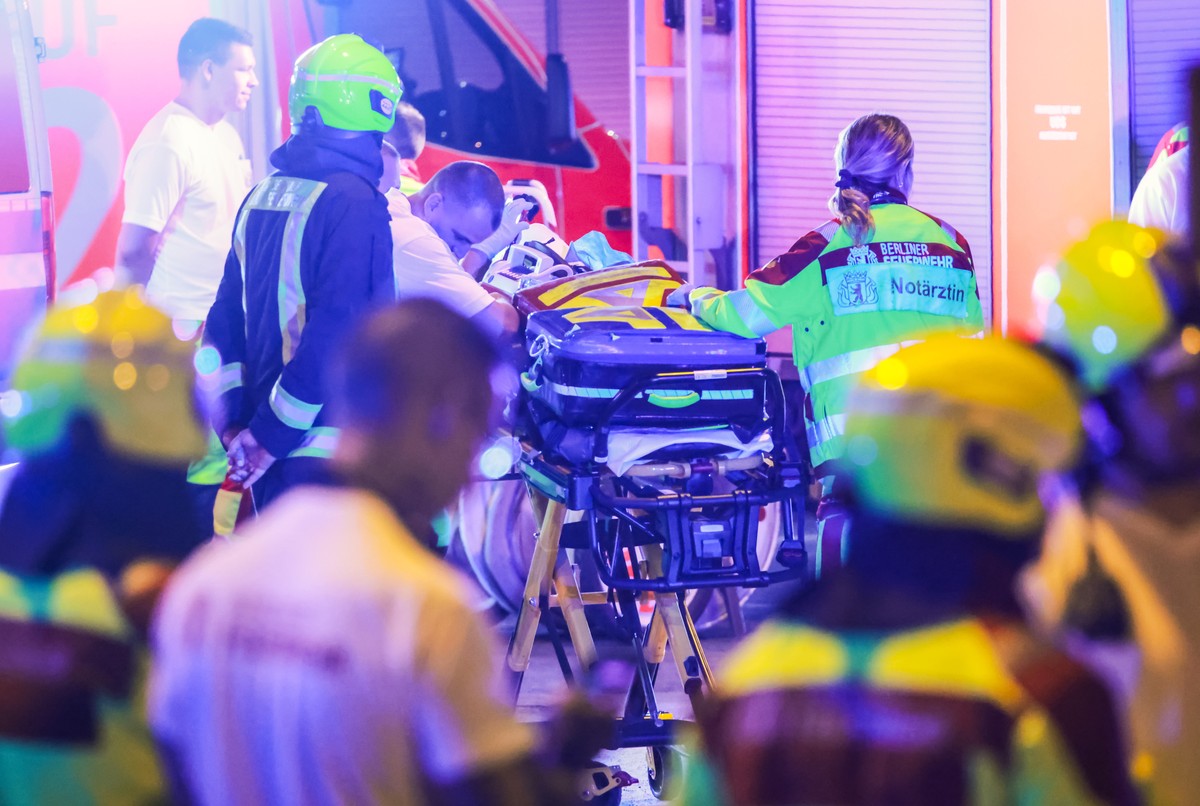 epa13132938 epa13132936 Police and security personnel work near the scene where several people were injured on the sideline of the Christopher Street Day (CSD) parade in Berlin, Germany, 25 July 2026. ...