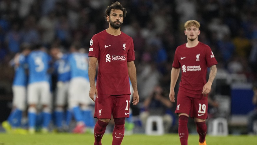 Liverpool&#039;s Mohamed Salah, centre, reacts after his team misses fourth goal during the group A Champions League soccer match between Napoli and Liverpool at the Diego Armando Maradona stadium in  ...