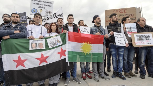 Demonstranten protestieren am 29. Januar in Genf gegen das Assad-Regime.