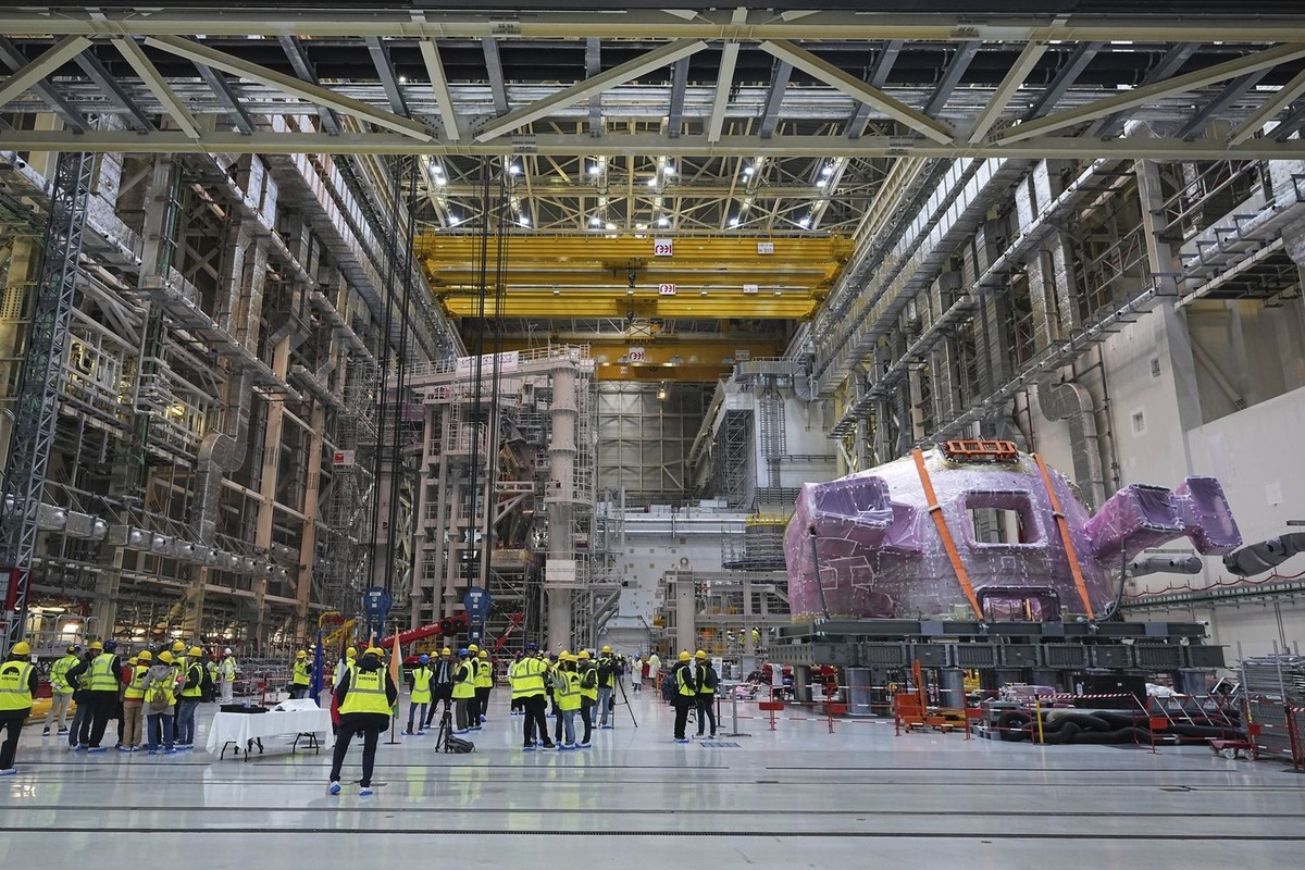Journalists wait ahead of French President Emmanuel Macron and Indian Prime Minister Narendra Modi visit to ITER (International Thermonuclear Experimental Reactor) in Saint-Paul-les-Durance, southern  ...