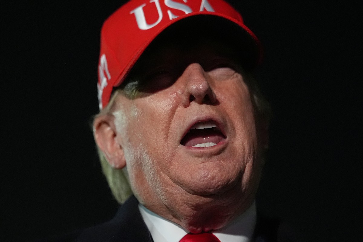 President Donald Trump speaks with reporters at Joint Base Andrews, Md., Sunday, April 12, 2026, after he returned from Miami. (AP Photo/Julia Demaree Nikhinson)
Trump