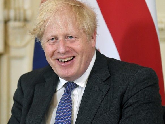 Britain&#039;s Prime Minister Boris Johnson reacts, during his meeting with Prime Minister of Bahrain, Prince Salman bin Hamad Al Khalifa, inside 10 Downing Street, in London, Thursday June 17, 2021.  ...