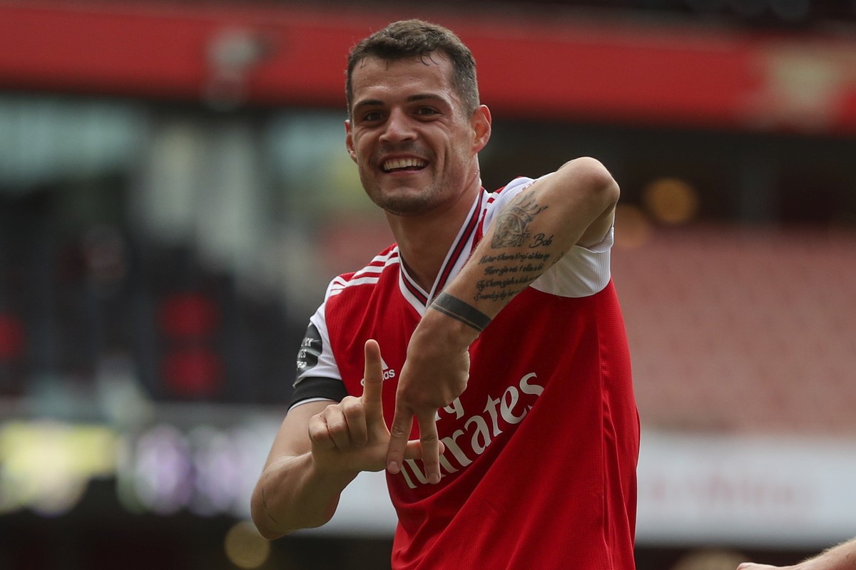 Arsenal's Granit Xhaka celebrates after scoring his side second goal during the English Premier League soccer match between Arsenal and Norwich City at the Emirates Stadium in London, England, We ...