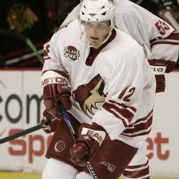 Phoenix Coyotes Patrick Fischer, of Switzerland, skates with the puck during the third period of an NHL hockey game against the Chicago Blackhawks in Chicago on Thursday, Dec. 7, 2006. The Coyotes won ...