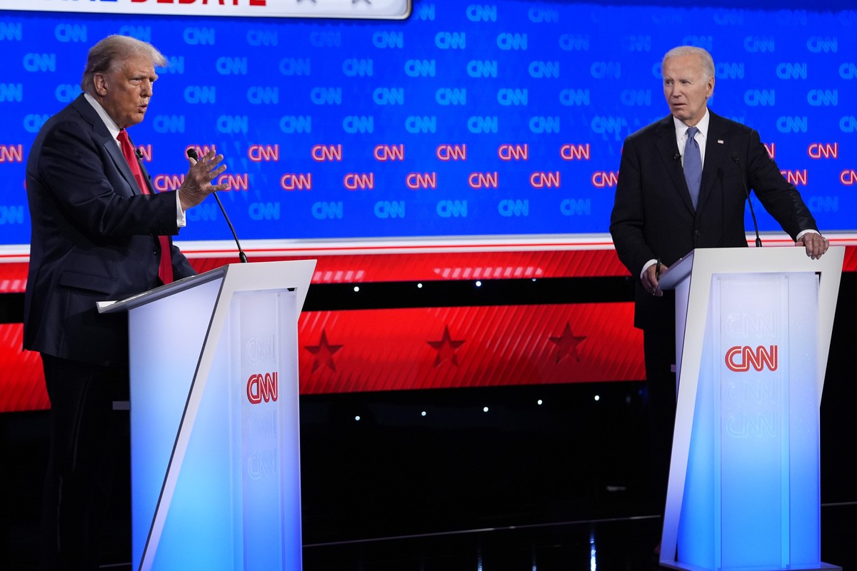 President Joe Biden, right, and Republican presidential candidate former President Donald Trump, left, participate in a presidential debate hosted by CNN, Thursday, June 27, 2024, in Atlanta. (AP Phot ...