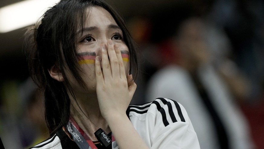 A soccer fan supporting Germany reacts at the end of the World Cup group E soccer match between Costa Rica and Germany at the Al Bayt Stadium in Al Khor , Qatar, Friday, Dec. 2, 2022. (AP Photo/Hassan ...