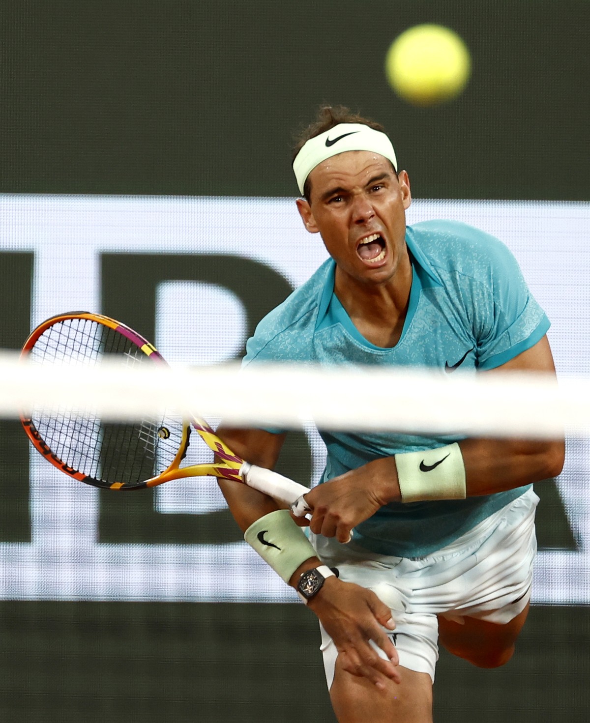 epa11373880 Rafael Nadal of Spain in action during his Men's Singles 1st round match against Alexander Zverev of Germany during the French Open Grand Slam tennis tournament at Roland Garros in Pa ...