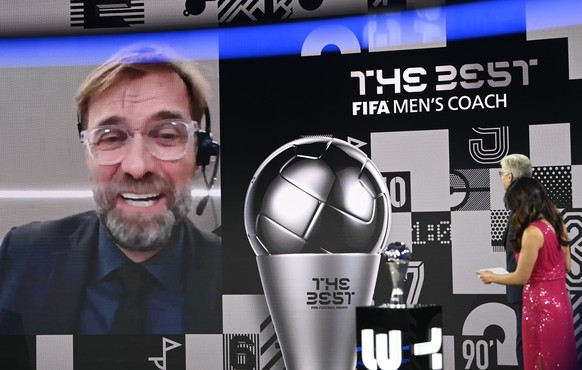 Liverpool's manager Jurgen Klopp smiles after being awarded as Men's coach of the year during the Best FIFA Football Awards Ceremony in Zurich, Switzerland, Thursday, Dec. 17, 2020. (Valeriano Di Dome ...