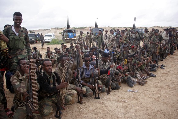 Military forces supporting anti-government opposition groups display their weapons in Mogadishu, Somalia Friday, May 7, 2021.. (AP Photo/Farah Abdi Warsameh)