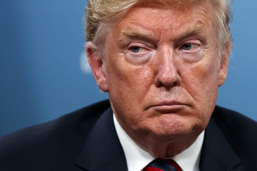 President Donald Trump listens during a meeting with French President Emmanuel Macron during the G-7 summit, Friday, June 8, 2018, in Charlevoix, Canada. (AP Photo/Evan Vucci)