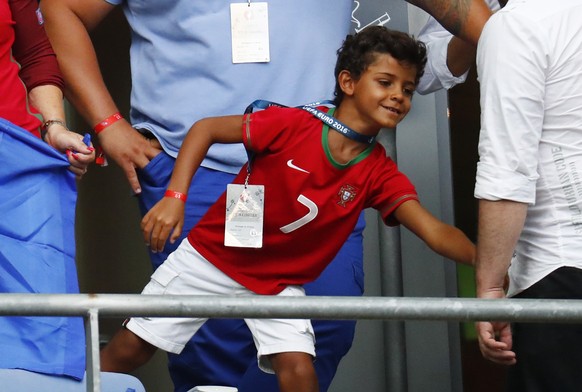 Football Soccer - Portugal v France - EURO 2016 - Final - Stade de France, Saint-Denis near Paris, France - 10/7/16
Son of Portugal&#039;s Cristiano Ronaldo, Cristiano Jr in the stands with other fam ...