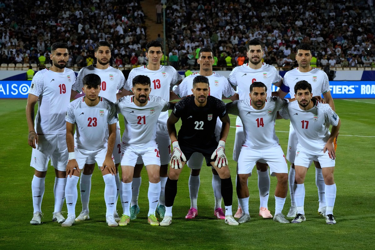 FILE - Irans's players pose for a team photo before an Asian group A qualifying soccer match against North Korea for the 2026 World Cup, June 10, 2025, at Azadi Stadium in Tehran, Iran. (AP Photo ...