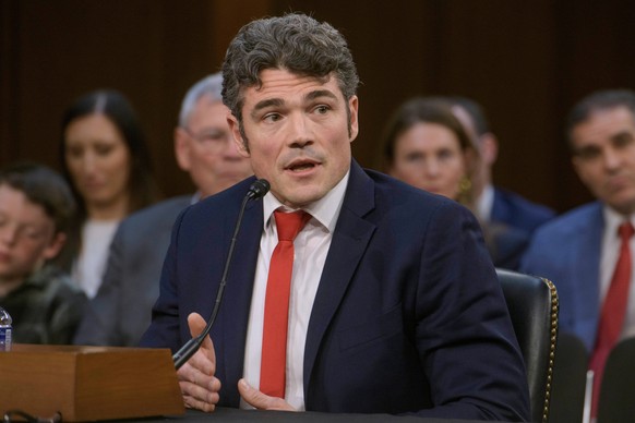 FILE - Joseph Kent appears before a Senate Committee on Intelligence hearing for his pending confirmation to be director of the National Counterterrorism Center, on Capitol Hill, April 9, 2025, in Was ...