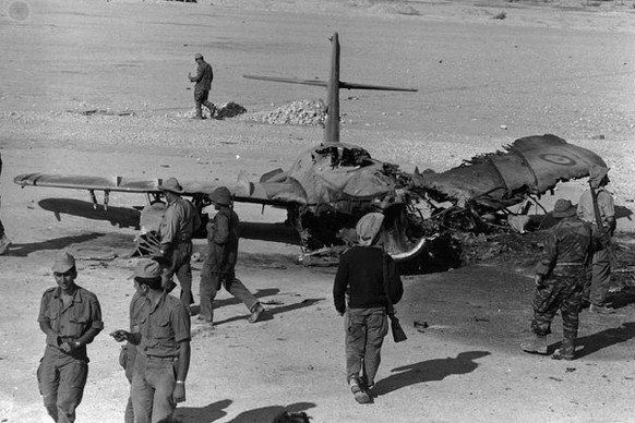A burnt out Egyptian aircraft at El Auth airport, Sinai, during the Six Day War