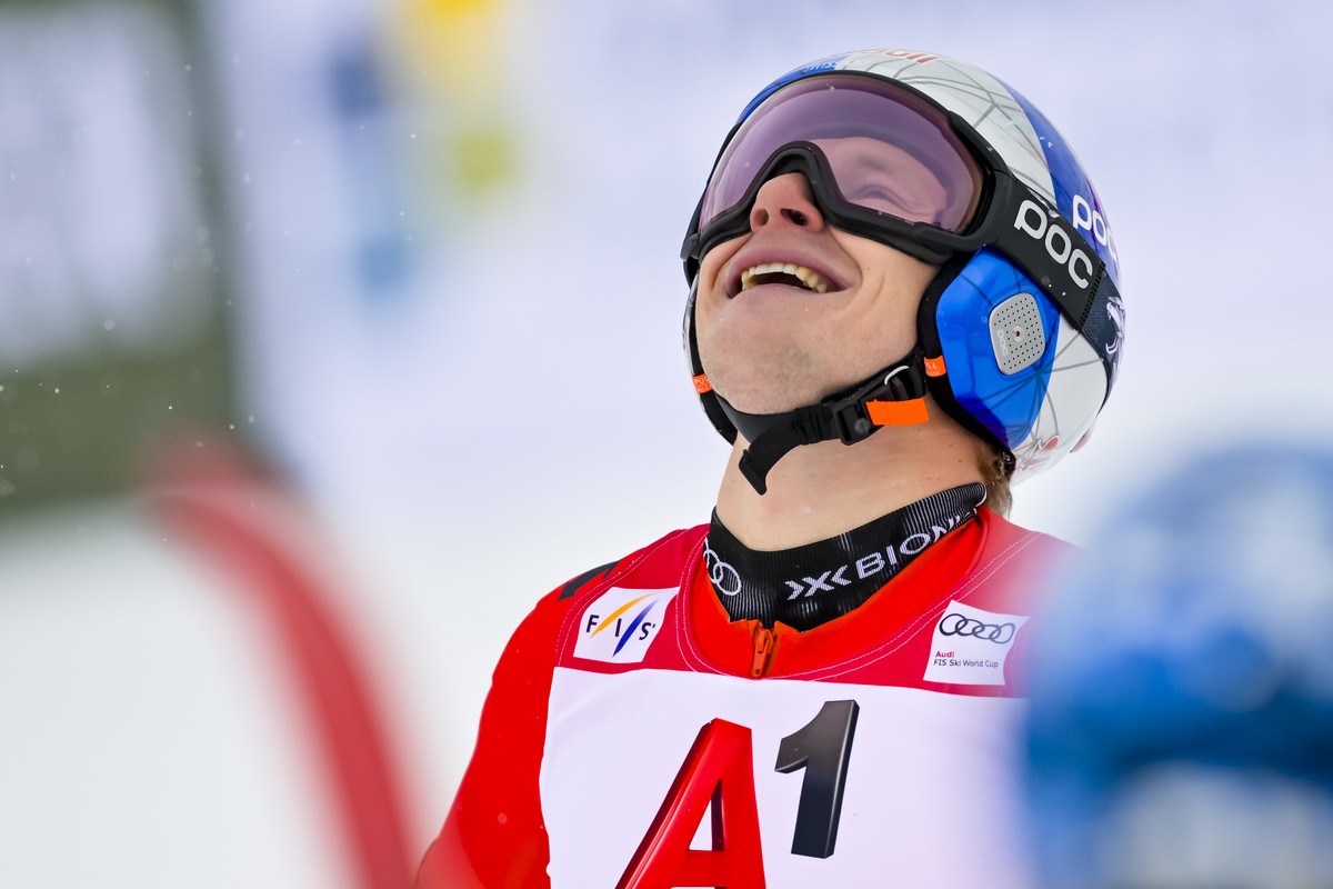 The winner Marco Odermatt from Switzerland celebrates in the finish area during the second run of the Mens Giant Slalom race of the FIS Alpine Ski World Cup season opener on the Rettenbach glacier, i ...