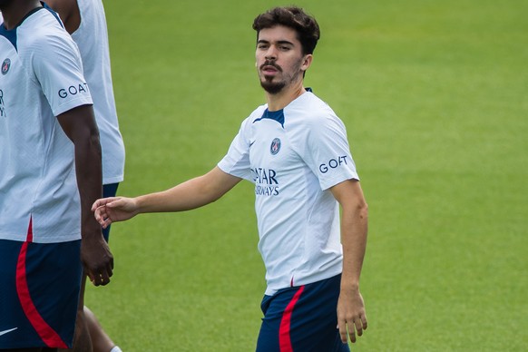 epa10105701 PSG's Vitinha takes part in a training session at the Camp des Loges sports complex in Saint Germain en Laye, near Paris, France, 04 August 2022. PSG faces Clermont Foot in a French Ligue ...