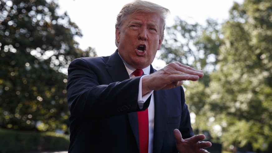 In this May 30, 2019, photo, President Donald Trump talks with reporters on the South Lawn of the White House in Washington. (AP Photo/Evan Vucci)