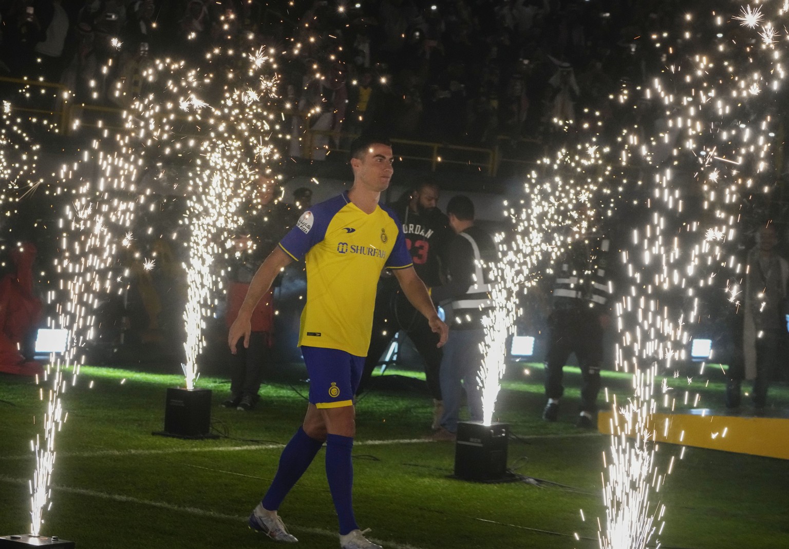 Cristiano Ronaldo walks during his official unveiling as a new member of Al Nassr soccer club in in Riyadh, Saudi Arabia, Tuesday, Jan. 3, 2023. Ronaldo, who has won five Ballon d&#039;Ors awards for  ...