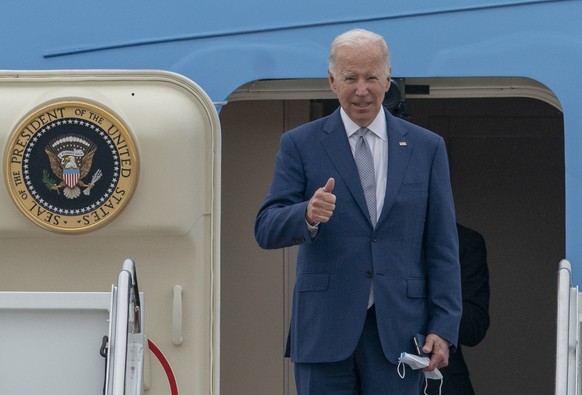 President Joe Biden gestures as he boards Air Force One at Andrews Air Force Base, Md., Tuesday, June 14, 2022. Biden is traveling to Philadelphia to speak at the AFL-CIO convention on how he&#039;s t ...