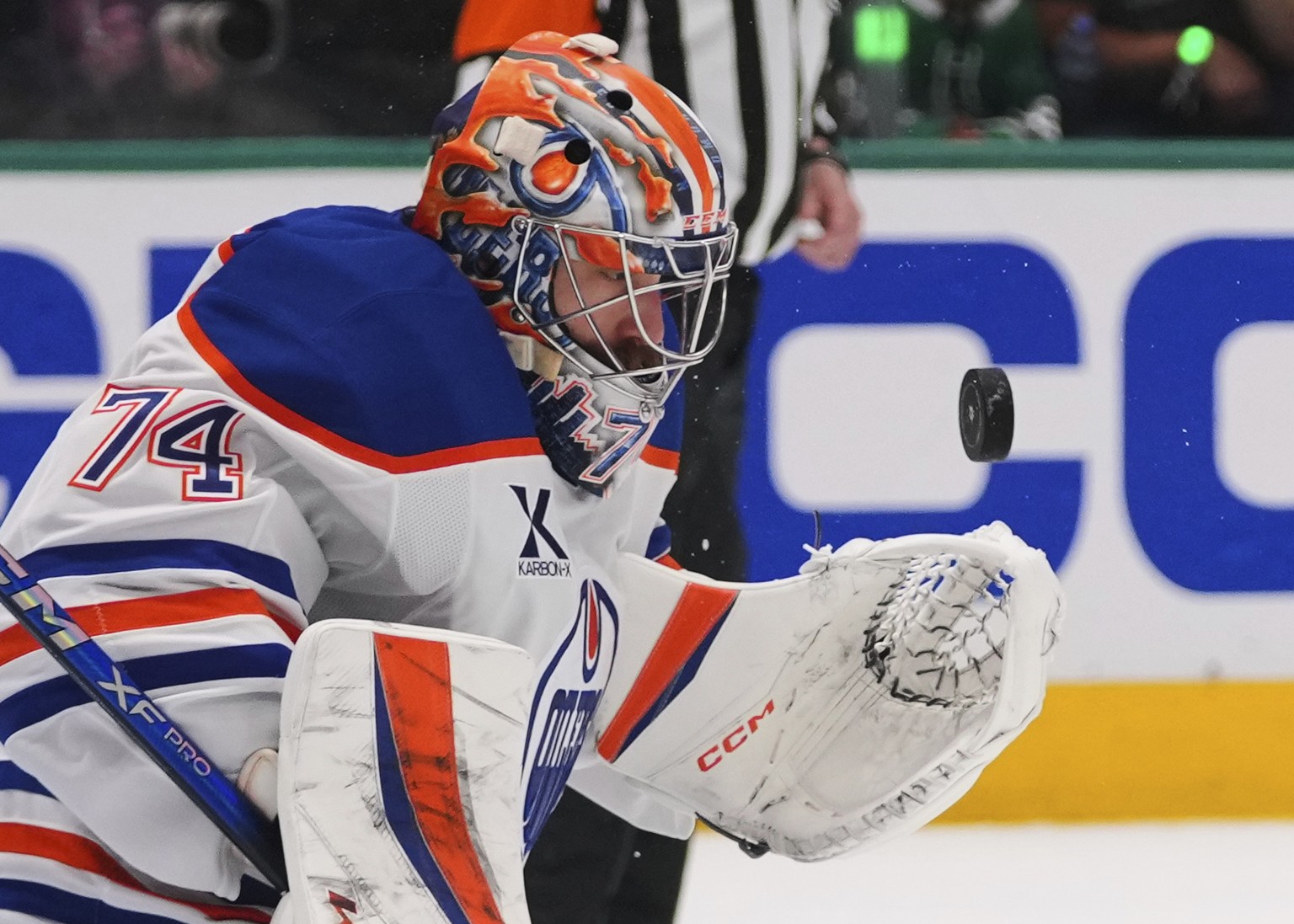 Edmonton Oilers goaltender Stuart Skinner stops a shot against the Dallas Stars during the first period of Game 5 of the Western Conference finals in the NHL hockey Stanley Cup playoffs, Thursday, May ...