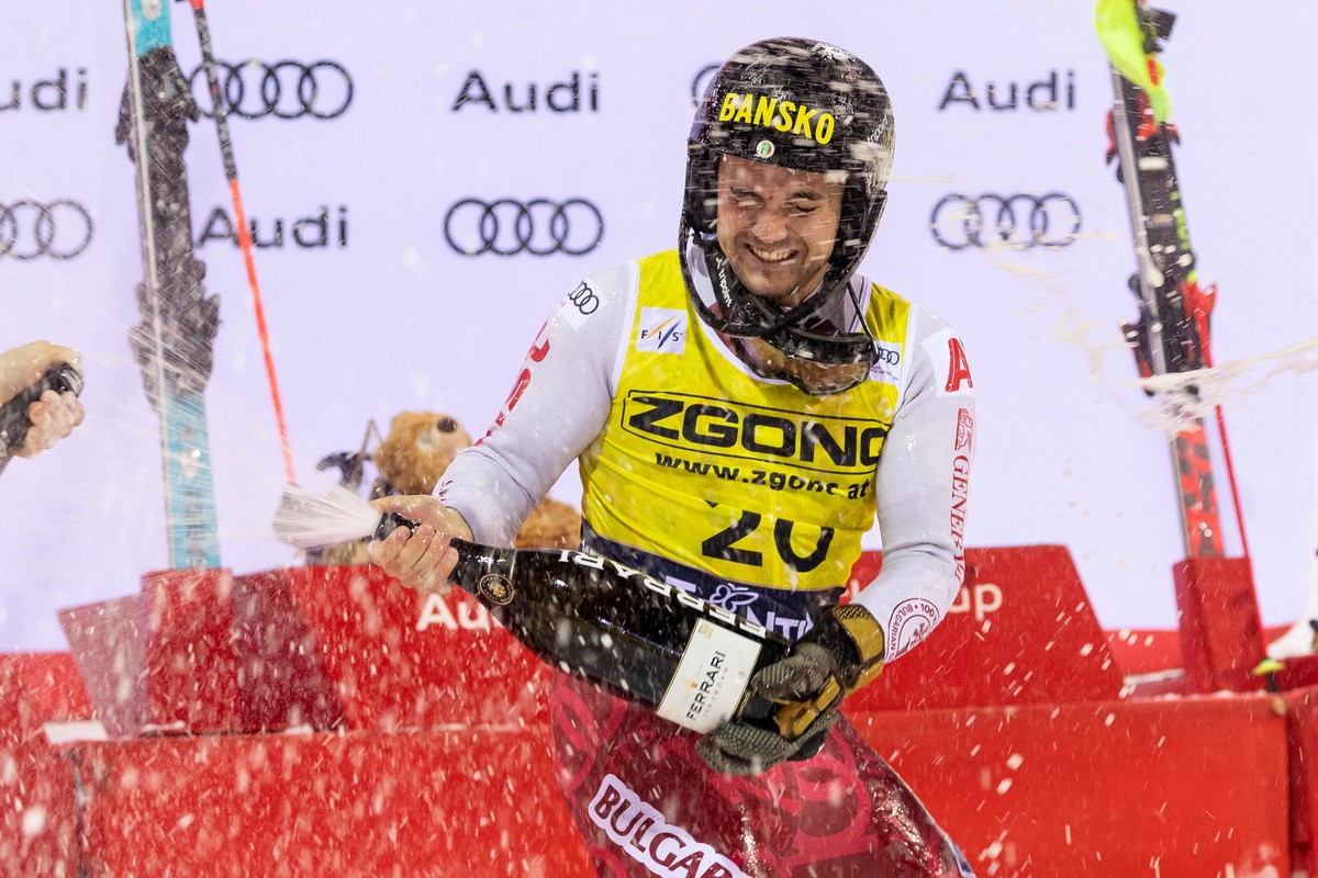 epa11813770 Winner Albert Popov of Bulgaria celebrates on the podium after the Men's Slalom race of the Alpine Skiing World Cup in Madonna di Campiglio, Italy, 08 January 2025. EPA/ANDREA SOLERO