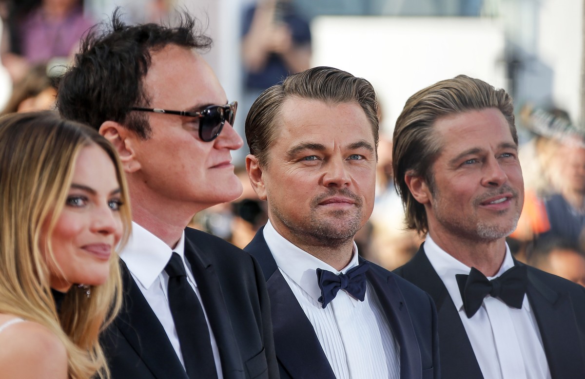 epa07589862 (L-R) Australian actress Margot Robbie, US director Quentin Tarantino, US actor Leonardo DiCaprio and US actor Brad Pitt arrive for the screening of 'Once Upon A Time... In Hollywood& ...