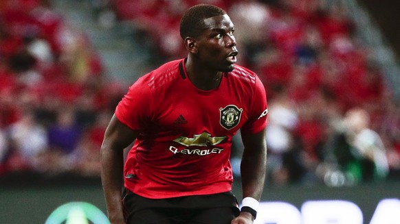 epa07729088 Manchester United&#039;s Paul Pogba in action during the International Champions Cup soccer match between Manchester United and Inter Milan at the National Stadium in Singapore, 20 July 20 ...