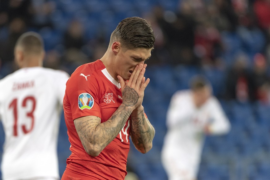 epa07465484 Switzerland&#039;s Steven Zuber reacts during the UEFA Euro 2020 qualifying Group D soccer match between Switzerland and Denmark at the St. Jakob-Park stadium in Basel, Switzerland, 26 Mar ...