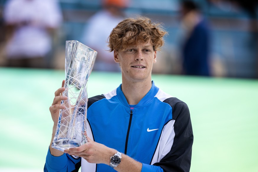 epa11253950 Jannik Sinner of Italy celebrates with his trophy after winning the Men&#039;s final match against Grigor Dimitrov of Bulgaria at the 2024 Miami Open tennis tournament at the Hard Rock Sta ...