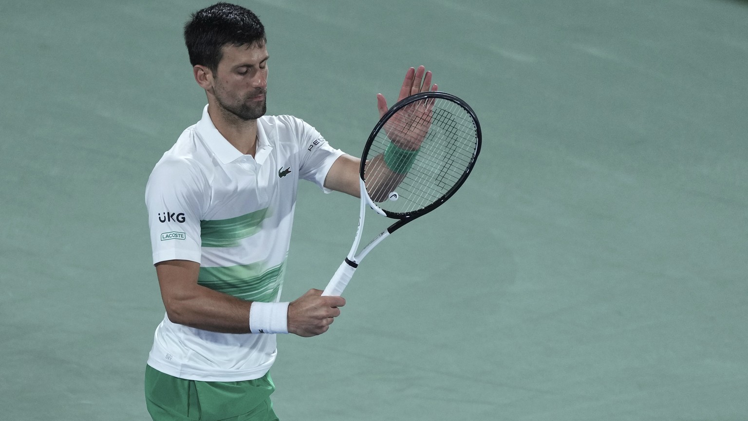 Serbia&#039;s Novak Djokovic reacts after he lost a point against Czech Republic&#039;s Jiri Vesely during a quarterfinal match of the Dubai Duty Free Tennis Championship in Dubai, United Arab Emirate ...