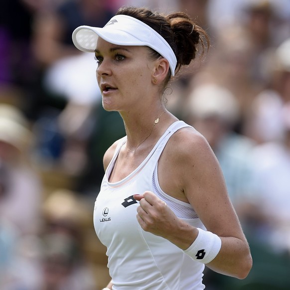 epa06070242 Agnieszka Radwanska of Poland in action against Christina McHale of the USA during their second round match for the Wimbledon Championships at the All England Lawn Tennis Club, in London,  ...