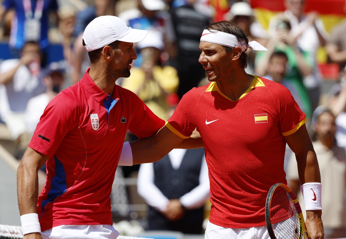 epaselect epa11505548 Rafael Nadal (R) of Spain and Novak Djokovic of Serbia greet each other ahead of their Men's Singles second round match at the Tennis competitions in the Paris 2024 Olympic  ...
