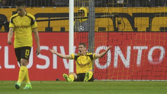 Dortmund&#039;s Sven Bender shouts after he scored an own goal during the Champions League quarterfinal first leg soccer match between Borussia Dortmund and AS Monaco in Dortmund, Germany, Wednesday,  ...