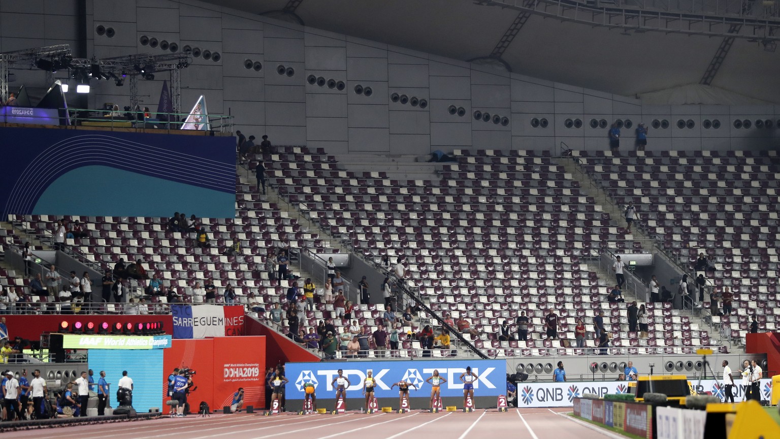 Empty seats before the the women's 100 meter final at the World Athletics Championships in Doha, Qatar, Sunday, Sept. 29, 2019. (AP Photo/Petr David Josek)