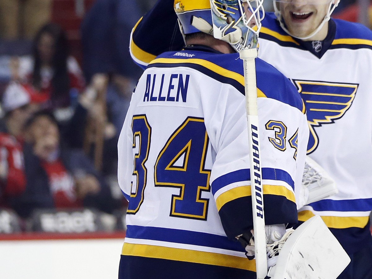 St. Louis Blues goalie Jake Allen (34) celebrates with defenseman Colton Parayko (55) after an NHL hockey game against the Washington Capitals, Saturday, March 26, 2016, in Washington. The Blues won 4 ...