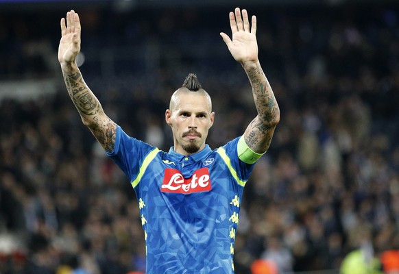 FILE - In this Wednesday, Oct. 24, 2018 file photo, Napoli&#039;s Marek Hamsik waves to the supporters at the end of the Champions League, group C, soccer match between Paris Saint Germain and Napoli  ...