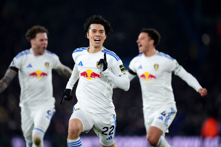 Leeds United&#039;s Ao Tanaka, center, of Japan, celebrates scoring his sides second goal against Chelsea during a English Premier League soccer match, Wednesday. Dec. 3, 2025, in Leeds, England. (Mik ...