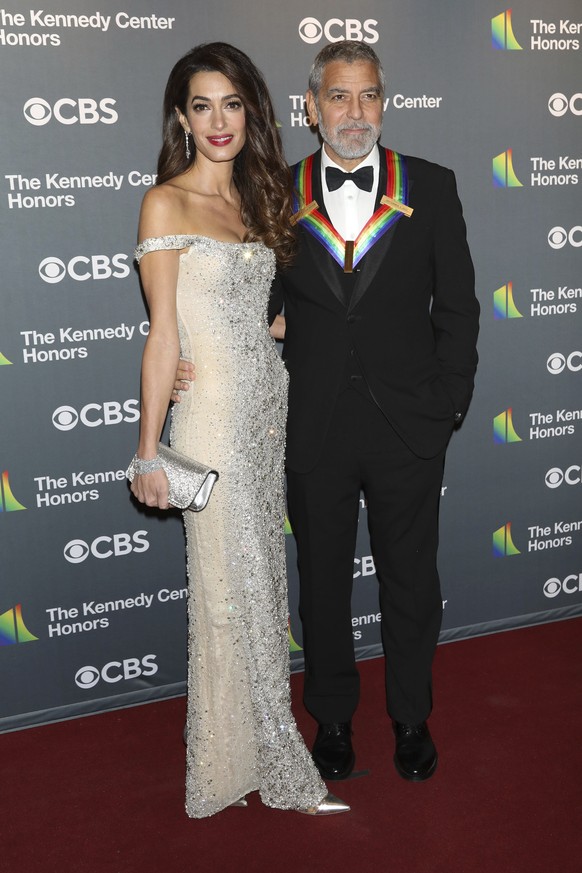 2022 Kennedy Center Honoree George Clooney and his wife, Amal Clooney, arrive at the Kennedy Center Honors on Sunday, Dec. 4, 2022, at The Kennedy Center in Washington. (Photo by Greg Allen/Invision/A ...