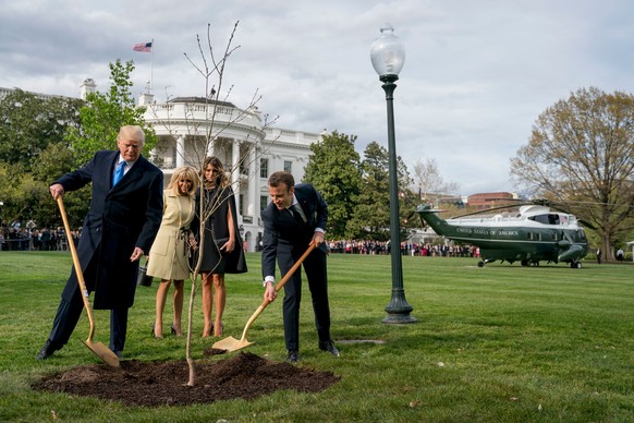 FILE- In this April 23, 2018, file photo, first lady Melania Trump, second from right, and Brigitte Macron, second from left, watch as President Donald Trump and French President Emmanuel Macron parti ...