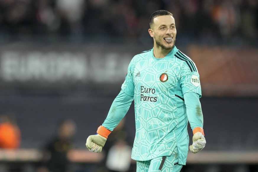 Feyenoord&#039;s goalkeeper Justin Bijlow celebrates during the first leg quarterfinal soccer match between Feyenoord and Roma at De Kuip stadium in Rotterdam, Netherlands, Thursday, April 13, 2023. ( ...