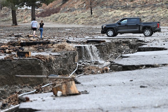 Flood damage is seen Thursday, Dec. 25, 2025, in Wrightwood, Calif. (AP Photo/William Liang)
Extreme Weather California
