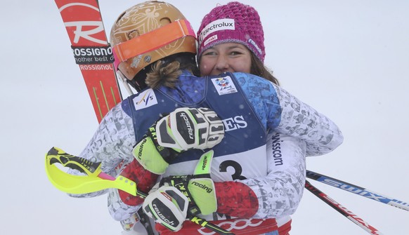 Alpine Skiing - FIS Alpine Skiing World Championships - Women's Alpine Combined - St. Moritz, Switzerland - 10/2/17 - Wendy Holdener of Switzerland is hugged by silver medalist Michelle Gisin of Switz ...