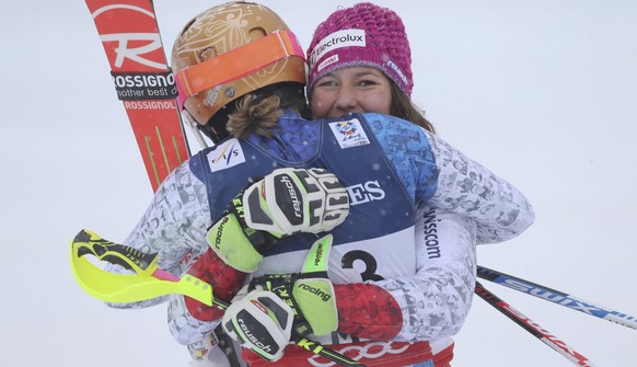 Alpine Skiing - FIS Alpine Skiing World Championships - Women&#039;s Alpine Combined - St. Moritz, Switzerland - 10/2/17 - Wendy Holdener of Switzerland is hugged by silver medalist Michelle Gisin of  ...