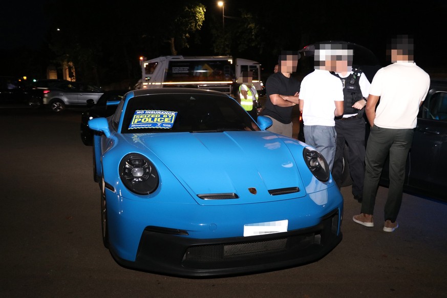 EDITORS NOTE IMAGE PIXELATED AT SOURCE Undated handout photo issued by Metropolitan Police of a seized Porsche 911 GT3. Officers from the Metropolitan Police seized 90 vehicles worth more than �8 mill ...
