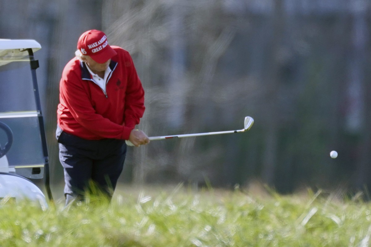 FILE - In this Nov. 28, 2020, file photo President Donald Trump plays golf at Trump National Golf Club in Sterling, Va. (AP Photo/Alex Brandon, File)
Donald Trump