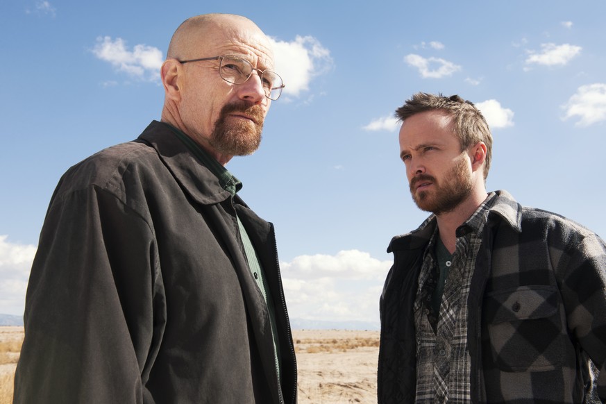 This image released by AMC shows Bryan Cranston as Walter White, left, and Aaron Paul as Jesse Pinkman in a scene from &quot;Breaking Bad.&quot; The Nielsen company, for the first time this season, is ...